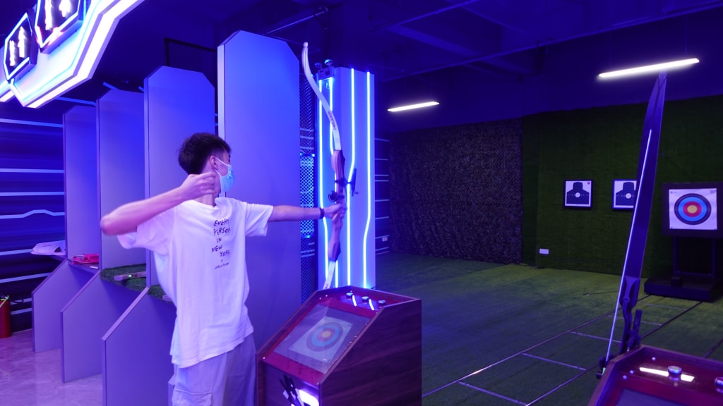 智能模拟射箭体验馆是一种集射箭体验、培训、比赛、娱乐为一体的综合性场所。它采用先进的虚拟现实技术，